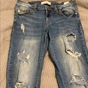distressed blue skinny jeans from the brand kancan
